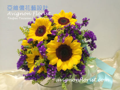 Bouquet of sunflowers and purple
