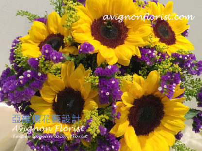 Sunflowers and purple flowers