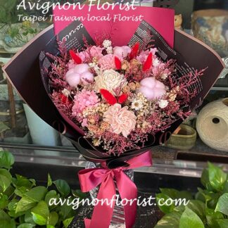 Red and pink dried flower bouquet