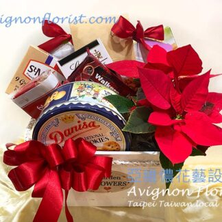 a Christmas gift basket of cookies and chocolates, etc.