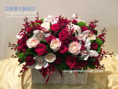 Large arrangement of Roses and orchids