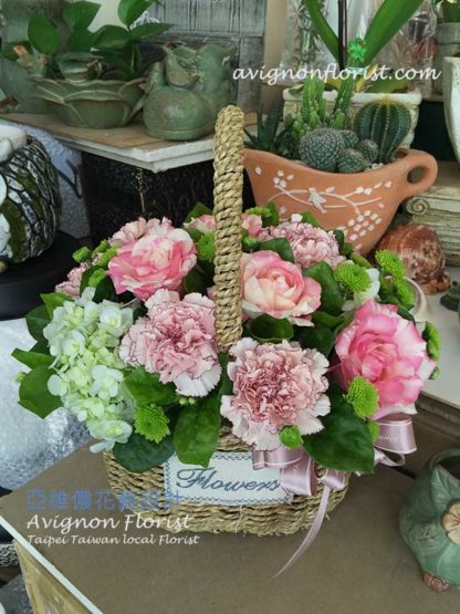 Carnations Hydrangea and Roses in a basket