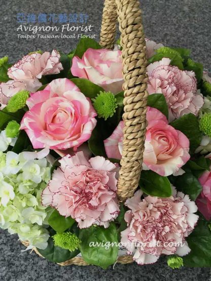 Basket of pink flowers