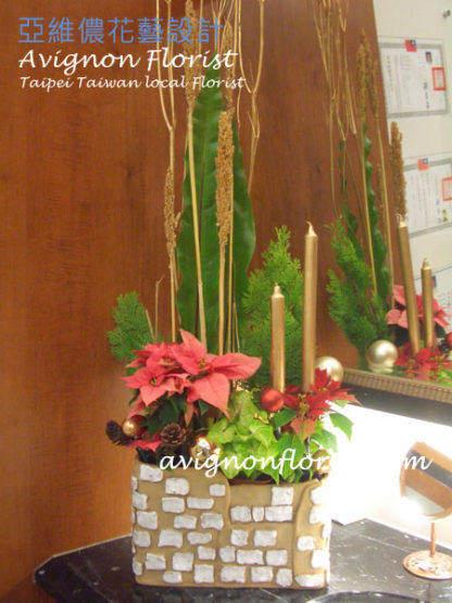 Christmas flowers with gold candles