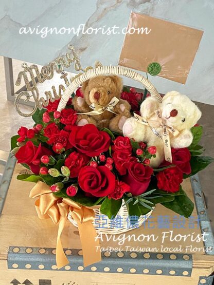 A basket of Roses with small bears