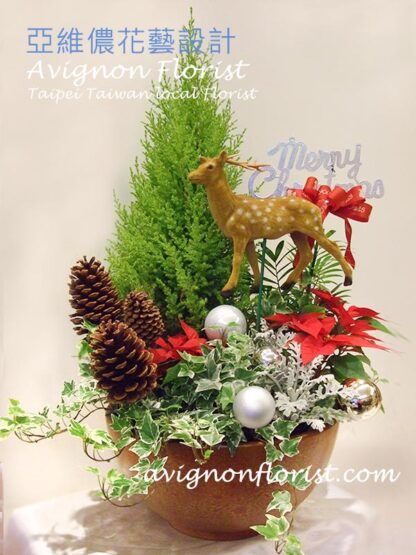 Small Christmas tree with decorations for table