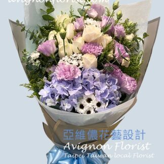 Bouquet of hydrangea, lisianthus, and roses