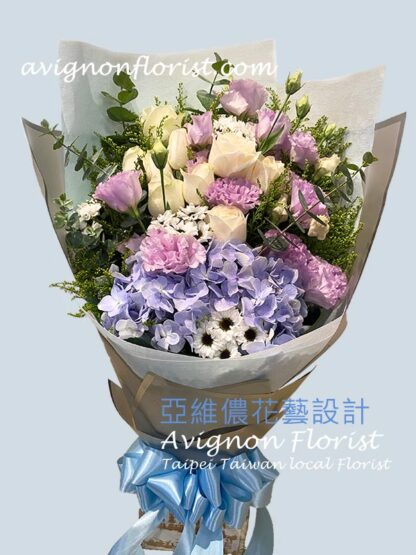 Bouquet of hydrangea, lisianthus, and roses